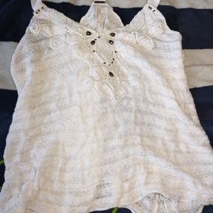 Free People beach tank, loose, white racer back. Woman's size Small